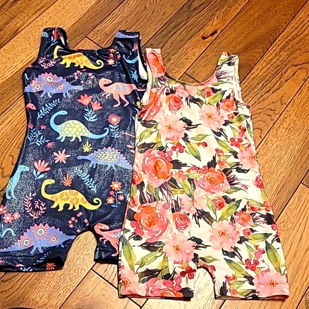 Two Gymnastic Leotards Flowers and Dinosaurs - size 100
